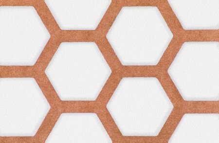 close-up of brown and white hexagon pattern wallpaper background texture