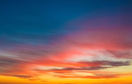 sunset scene wallpaper background, colorful sky with soft clouds,の写真素材