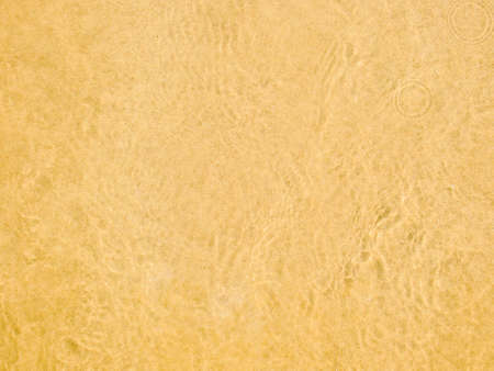 golden sand with water beachの写真素材