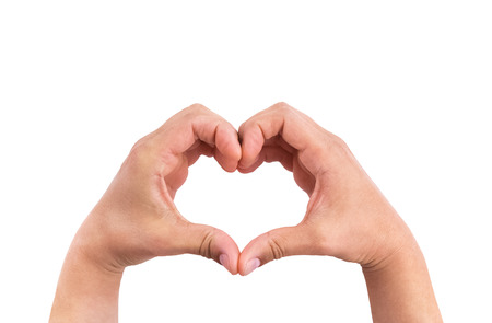 man hands in the form of heart against the white background, hands in shape of love heart valentine day conceptの写真素材