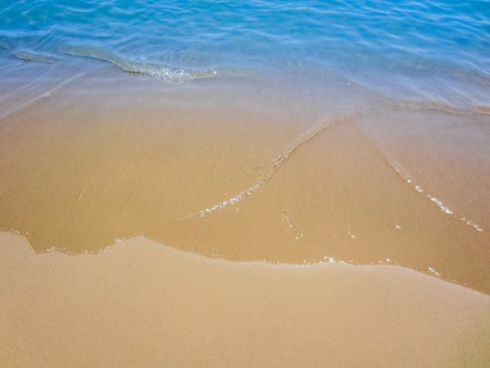 golden sand with beach and blue tropical seaの写真素材