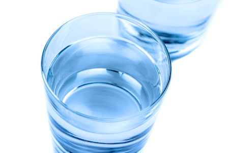 top of view of drink glass with water, nutrition and health-care concept, nutrition and health-care concept on white backgroundの写真素材