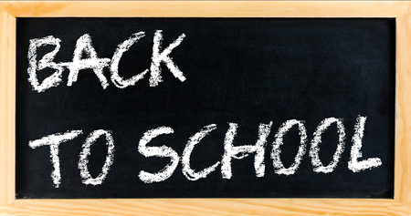 blackboard frame with written back to school, school or university education conceptの写真素材