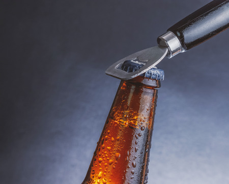 fresh cold beer ale bottle with dropsの写真素材