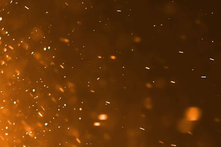 gold dust particles flowing background loop seamless ready, golden light spot movementの写真素材
