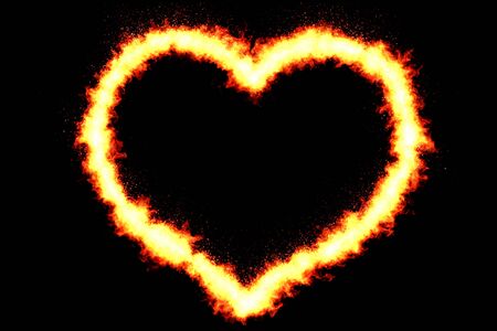heart made by burning flames on black background with fire particles, valentine day and love conceptの写真素材