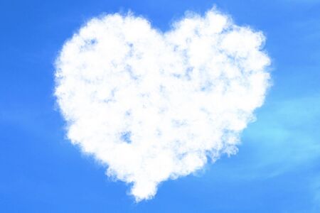 abstract heart filled love concept draw on the blue sky with white clouds background with alpha channel matte, valentine day holiday event festive symbol sign conceptの写真素材