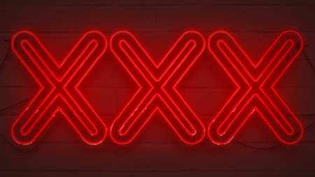 flickering blinking red neon sign on brick wall background, sexy adult show night club xxx sign conceptの写真素材