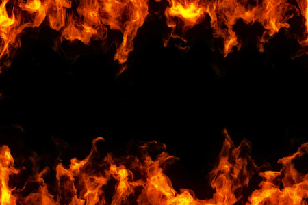 frame of real fire flames burn motion on black backgroundの写真素材