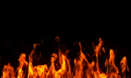 realistic fire flames burn movement frame on black backgroundの写真素材
