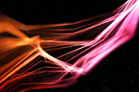 abstract stream array colorful glitter sparkle yellow, orange lines with particles  on black background science and research conceptの写真素材