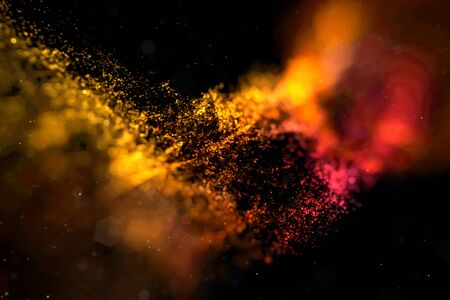 abstract stream array colorful glitter sparkle yellow, orange lines with particles on black background science and research conceptの写真素材
