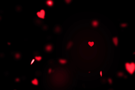 red colorful hearts flying animation on black background, love and valentine day conceptの写真素材