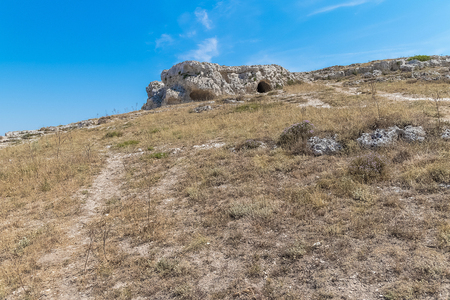 panoramic view of typical stones house (Sassi di Matera) of Matera UNESCO European Capital of Culture 2019 under blue sky. Basilicata, Italyの写真素材