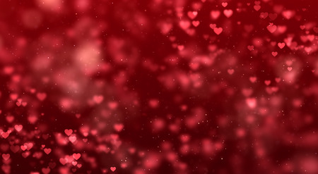 abstract christmas gradient red gradient background with bokeh glitter and red hearts shape flowing, valentine day love relationship holiday event festive conceptの写真素材