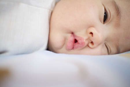 Children sleep on the floor.  Children sleep on the floor.の写真素材