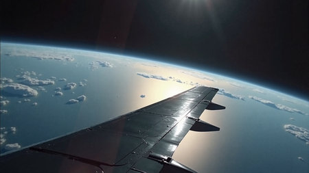 Satellite solar panel unfolding in earth orbit for communicationの素材