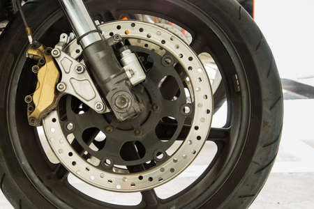 motorbike front wheel closeup viewの写真素材