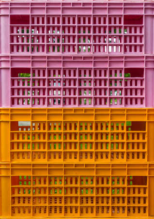 Bright colorful plastic boxes backgroundの写真素材