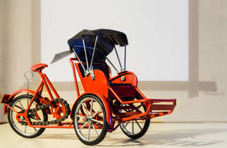 red color metal tricycle toy pedicabの写真素材