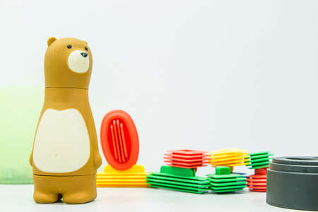 plastic toy bear on tableの写真素材