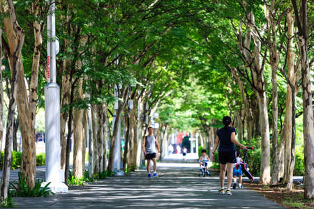 Singapore-13 APR 2019:people free walking on the green Boulevardのeditorial素材