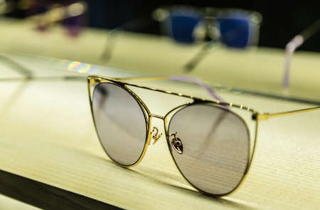 fashion metal sun glasses display on table