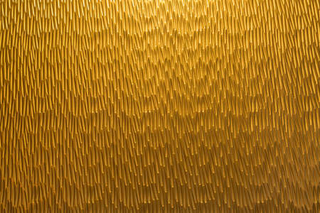 metal or plastic golden color wall background textureの写真素材