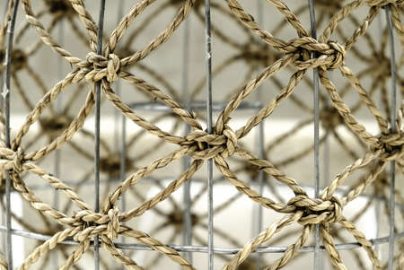 brown color Worn rope net background closeup view