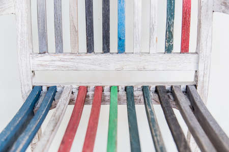 rainbow color paint wood chair closeup viewの写真素材