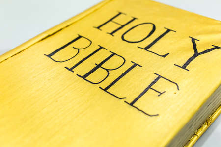 golden color holy bible cover closeup viewの写真素材