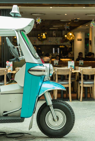 blue color vintage Tuk Tuk motorbike closeup