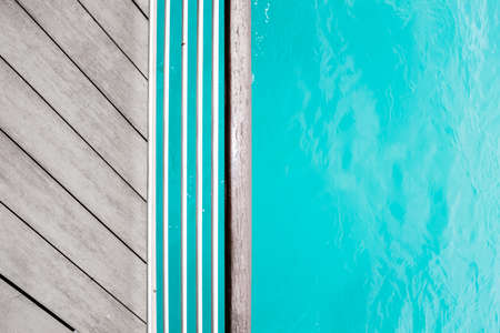 wood deck and blue sea background viewの写真素材