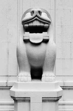 Singapore-30 JUN 2018: white color funny Stone lion sculpture on streetのeditorial素材