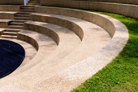 the steps of the outdoor grass seating in parkの写真素材
