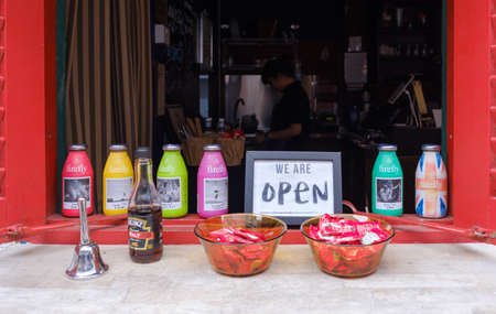 Singapore-10 MAR 2018: open sign board on wood bar windowのeditorial素材