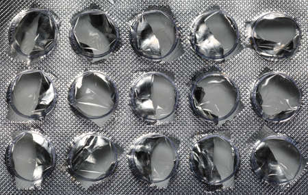 Collection of used tablet and pill coverの写真素材