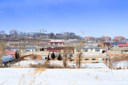 China north part small village over view.all city covered by white snowのeditorial素材