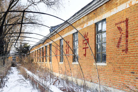 Hegang city,China-15 FEB 2018: abandoned school building in China north areaのeditorial素材