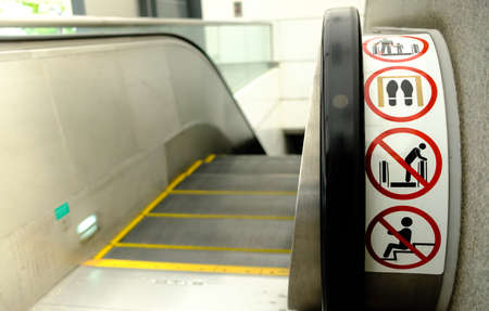 Escalator Guidelines. signs on an escalator, warning signsの写真素材