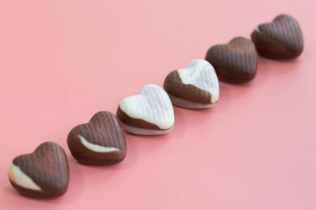 chocolate heart Valentine's day on pink background for textureの写真素材