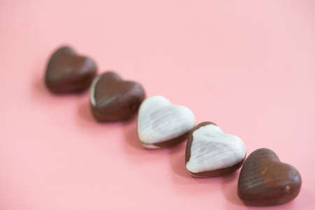 chocolate heart Valentine's day on pink background for textureの写真素材