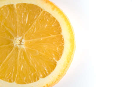 Slice of fresh orange isolated on white backgroundの写真素材