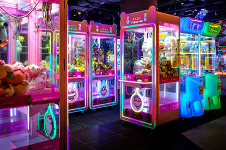Singapore-29 JAN 2020:Claw Machine,kids toy crane machine in darkの写真素材