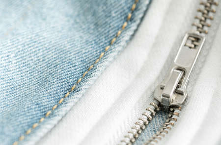 white zipper and lock closeup detail viewの写真素材