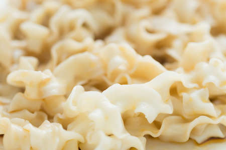 chinese style wide noodles pasta close up viewの写真素材