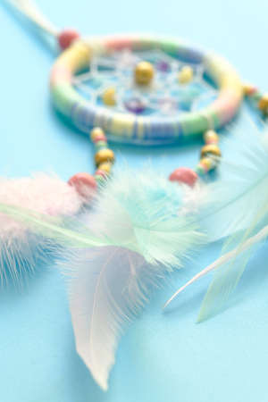 Close up of dream catchers on light blue backgroundの写真素材