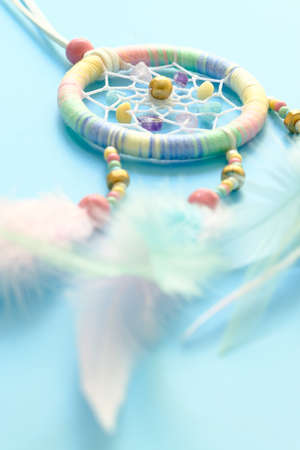 Close up of dream catchers on light blue backgroundの写真素材