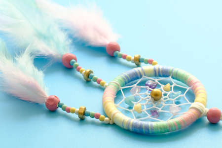 Close up of dream catchers on light blue backgroundの写真素材