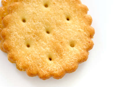 Stack of sweetmeal digestive biscuits isolated on whiteの写真素材